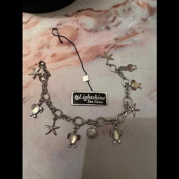 Jewelry - Seaside Charm Bracelet with Starfish and Shell Accents